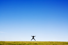 This photo shows a business man jumping for joy. Finding a job can be difficult but this man has followed this article's advice and has found success